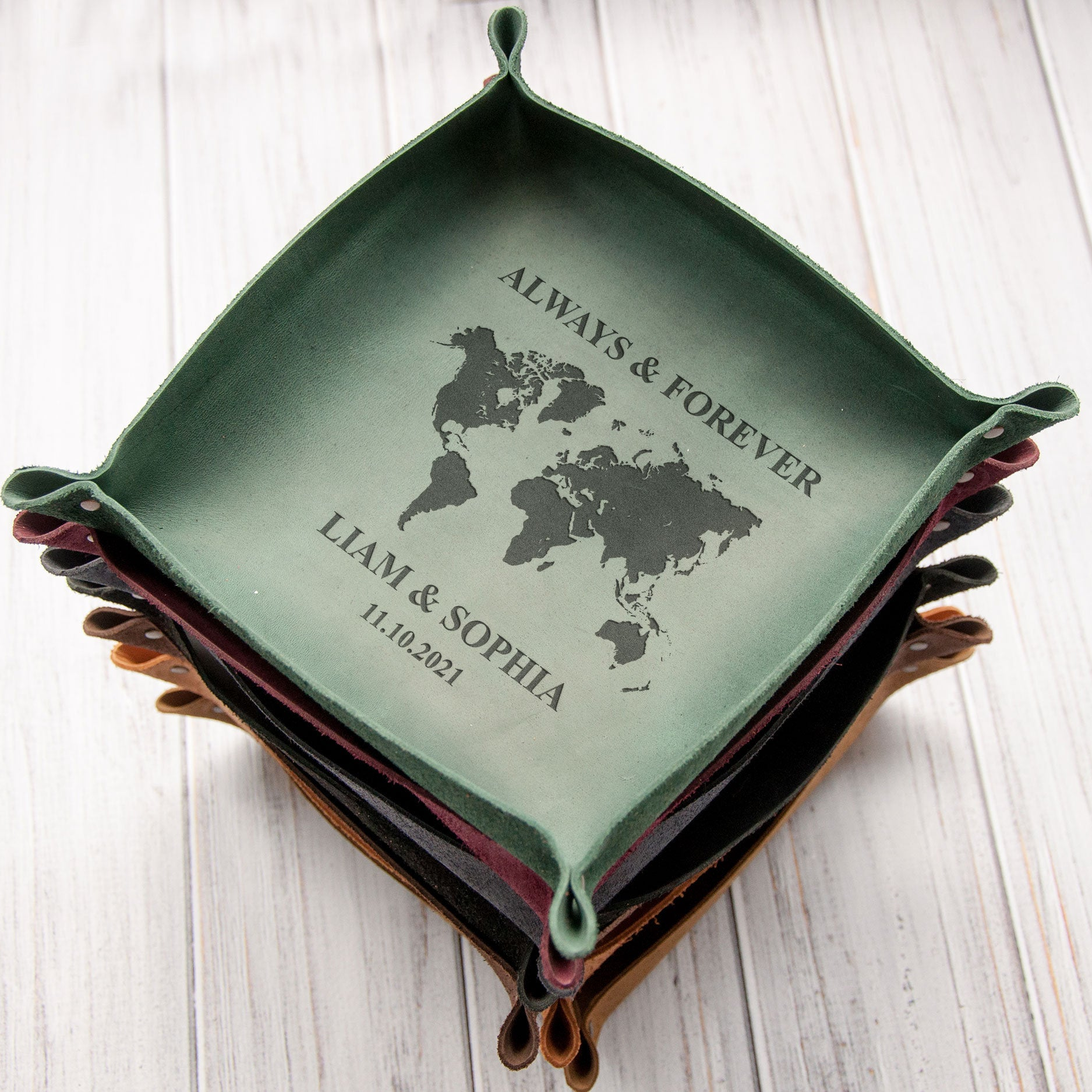 A green tray with a world map design and the text "ALWAYS & FOREVER LAM & SOPHIA 11.02.2021" printed on it.