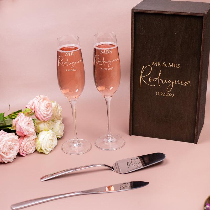 Champagne Toasting Glasses and Engraved cake Server and Knife